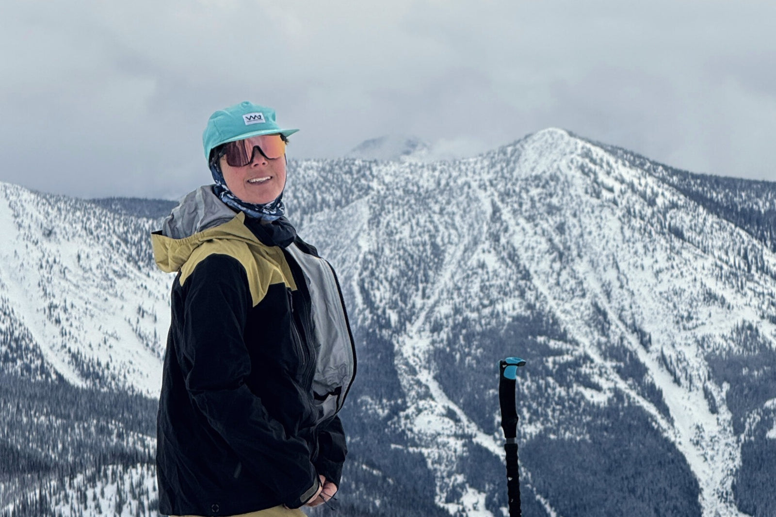 Person standing on a snowy mountain